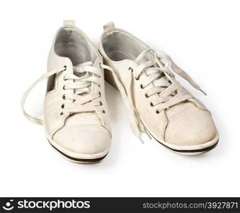 dirty white shoes isolated on a white background
