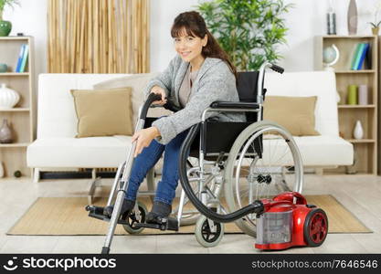 disable woman legs and vacuum cleaner