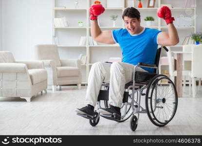 Disabled boxer at wheelchair recovering from injury