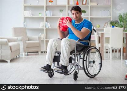 Disabled boxer at wheelchair recovering from injury. The disabled boxer at wheelchair recovering from injury