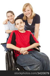 Disabled boy in wheelchair with his brother and sister. Isolated on White.