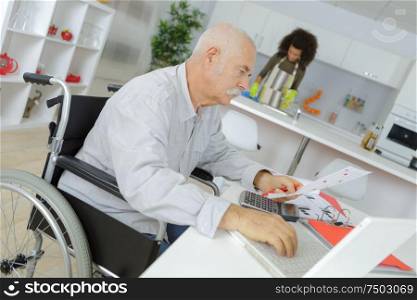 disabled businessman at home