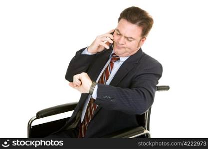Disabled businessman looking at his watch while having a long boring phone conversation. Isolated on white.
