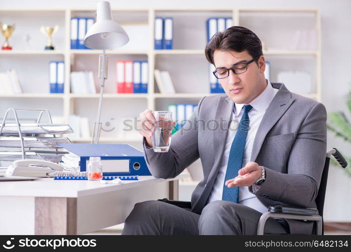 Disabled businessman working in the office