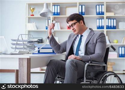 Disabled businessman working in the office