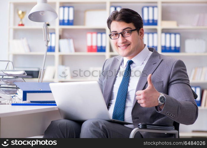 Disabled businessman working in the office