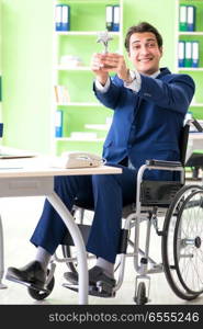 Disabled businessman working in the office