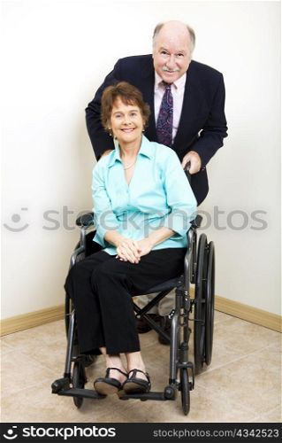 Disabled businesswoman and her male business partner.