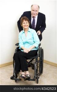 Disabled businesswoman and her male business partner.