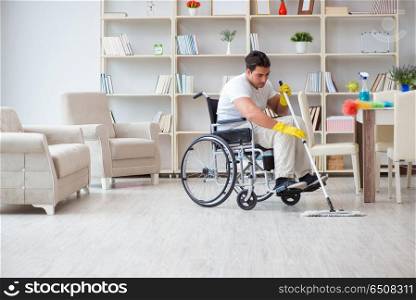 Disabled man cleaning floor at home