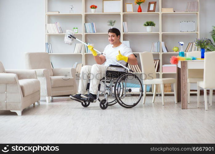 Disabled man cleaning floor at home