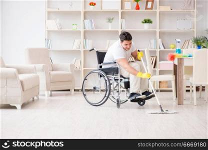 Disabled man cleaning floor at home