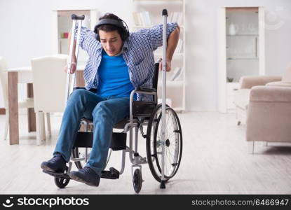 Disabled man listening to music in wheelchair