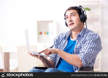 Disabled man listening to music in wheelchair