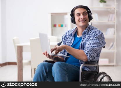 Disabled man listening to music in wheelchair
