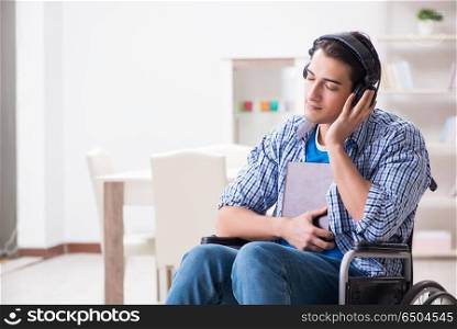 Disabled man listening to music in wheelchair