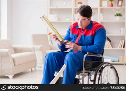 Disabled man measuring with meter