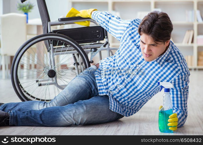 Disabled man on wheelchair cleaning home