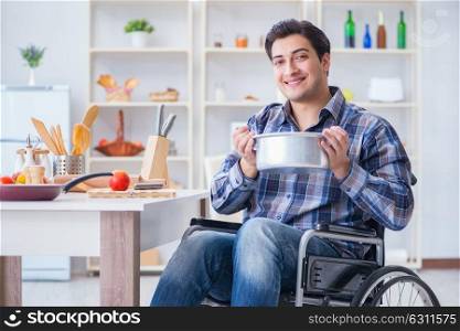 Disabled man preparing soup at kitchen