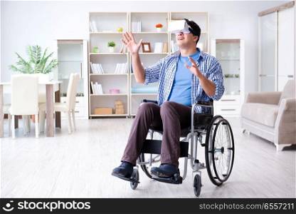 Disabled man studying with virtual reality glasses