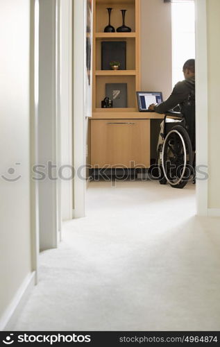 Disabled man telecommuting