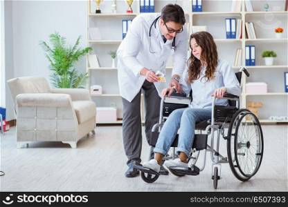Disabled patient on wheelchair visiting doctor for regular check. Disabled patient on wheelchair visiting doctor for regular check up. Disabled patient on wheelchair visiting doctor for regular check