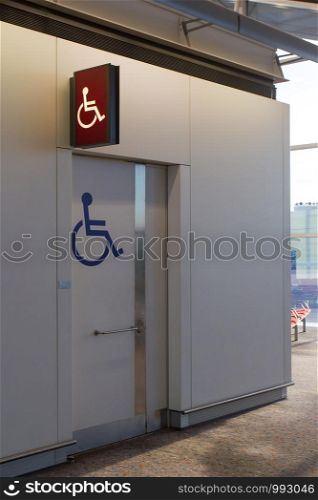 Disabled people sign at the airport toilet