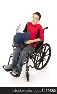 Disabled schoolboy in his wheelchair. Full body isolated.