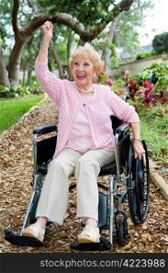Disabled senior lady in pink, excited about achieving her health goals.