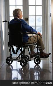 Disabled Senior Man Sitting In Wheelchair