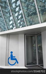 Disabled sign at the entrance of Seattle Central Library, Seattle, Washington State, USA