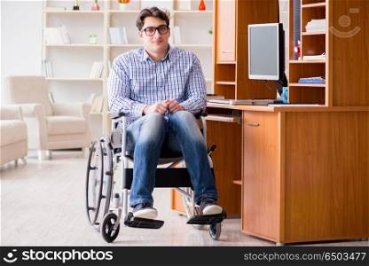 Disabled student studying at home on wheelchair