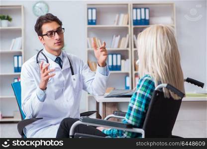 Disabled woman in wheel chair visiting man doctor
