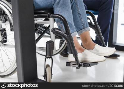 disabled woman s feet wheel chair white floor