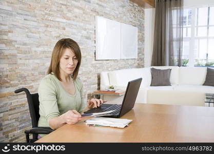 Disabled woman telecommuting
