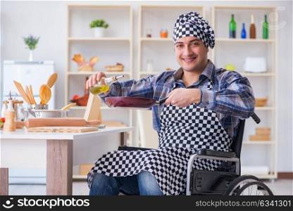 Disabled young husband frying at kitchen