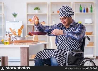 Disabled young husband frying at kitchen