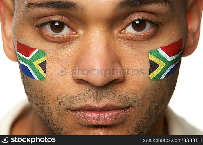 Disappointed Young Male Sports Fan With South African Flag Painted On Face