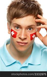 Disappointed Young Male Sports Fan With Swiss Flag Painted On Face
