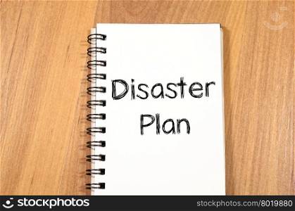 Disaster plan text concept write on notebook