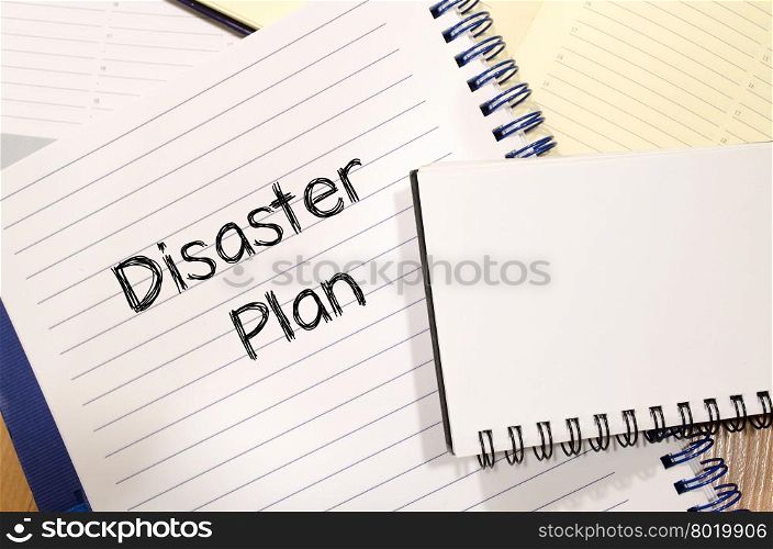 Disaster plan text concept write on notebook