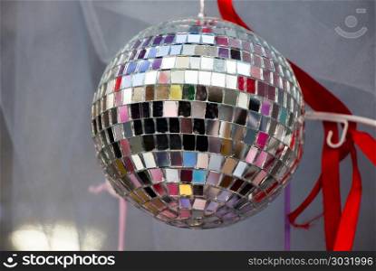 disco ball for dancing in a disco club. disco ball with mirror pieces for dancing in a disco club