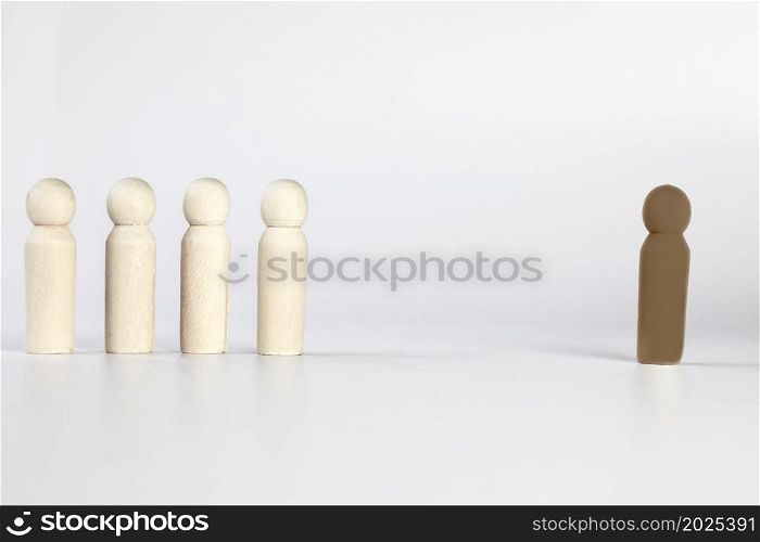 Discrimination, one black person left out of white group, standing out of the crowd concept. Racism isolated on white background space for text. Discrimination, one black person left out of white group, standing out of the crowd concept. Racism isolated on white background