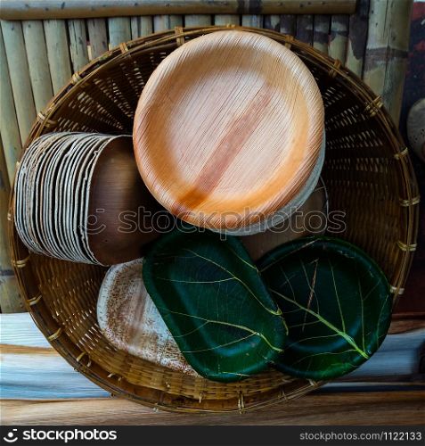 Dish from natural materials, eco friendly disposible dish made from natural leaf. compostable tableware for reducing waste in environment