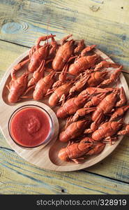 Dish of boiled crayfish with sauce