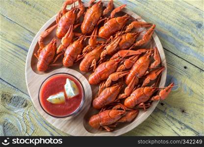 Dish of boiled crayfish with sauce
