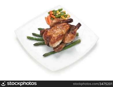 dish of fried chicken with vegetables isolated on white background