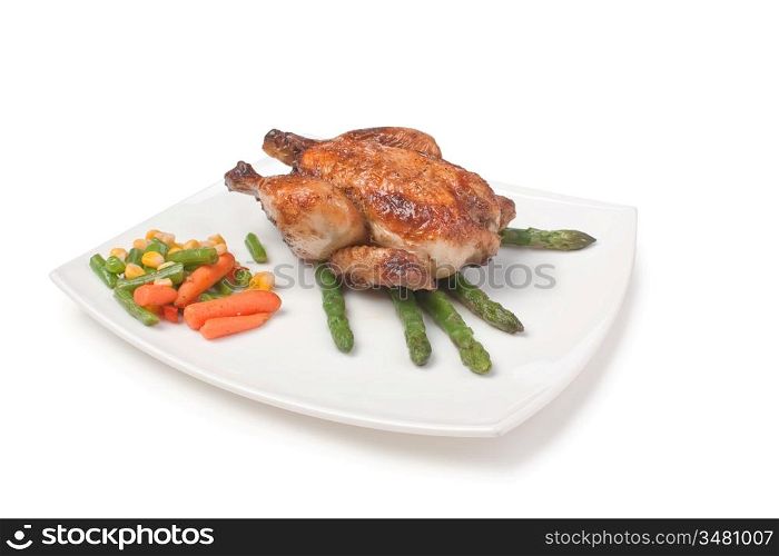 dish of fried chicken with vegetables isolated on white background