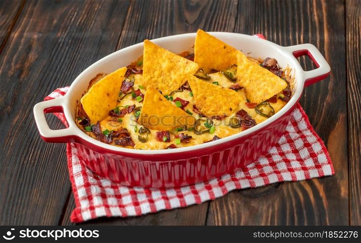 Dish of Jalapeno popper dip with cheese and bacon