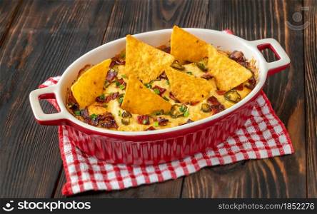 Dish of Jalapeno popper dip with cheese and bacon
